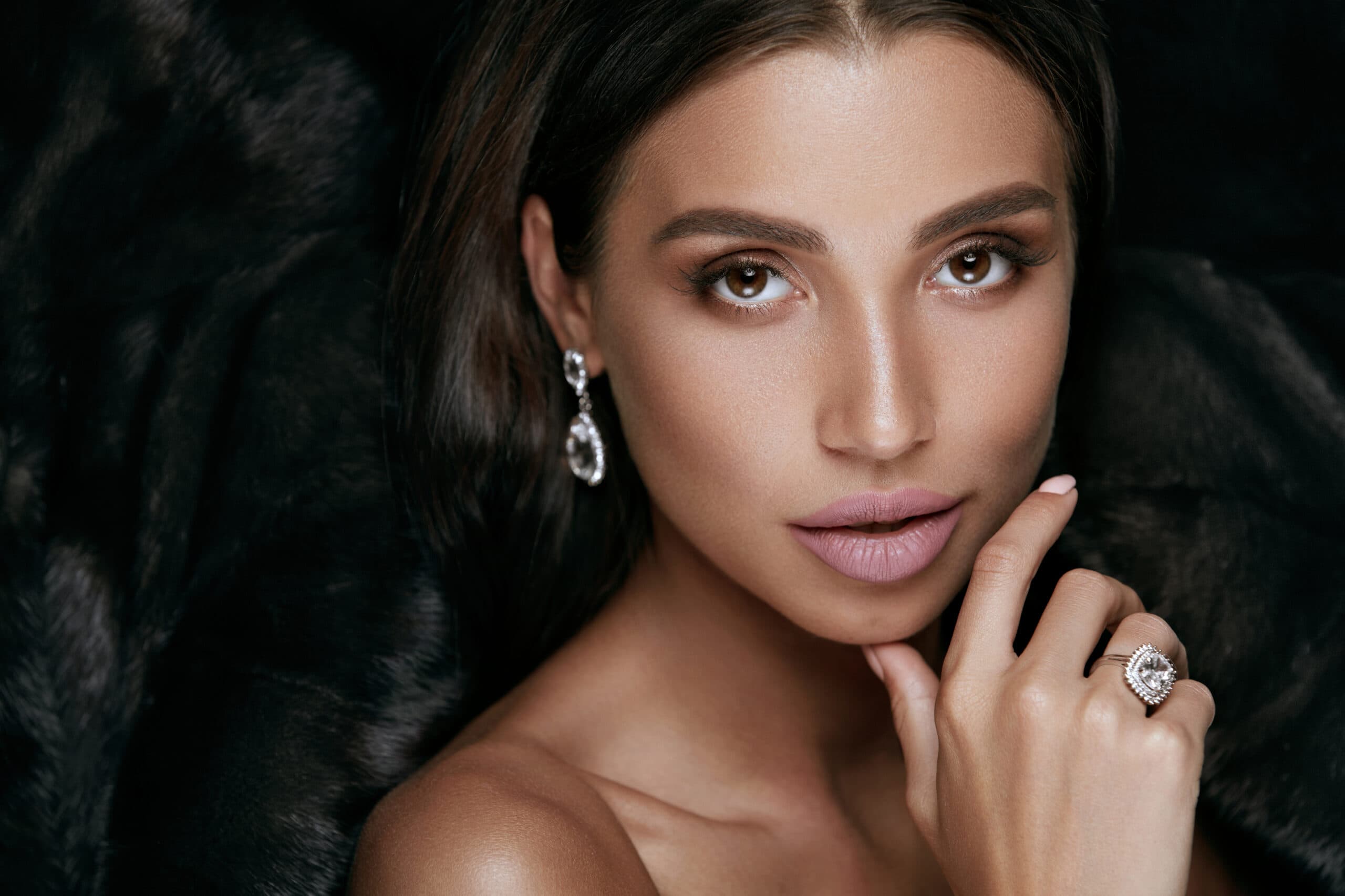 Model wearing diamond earrings